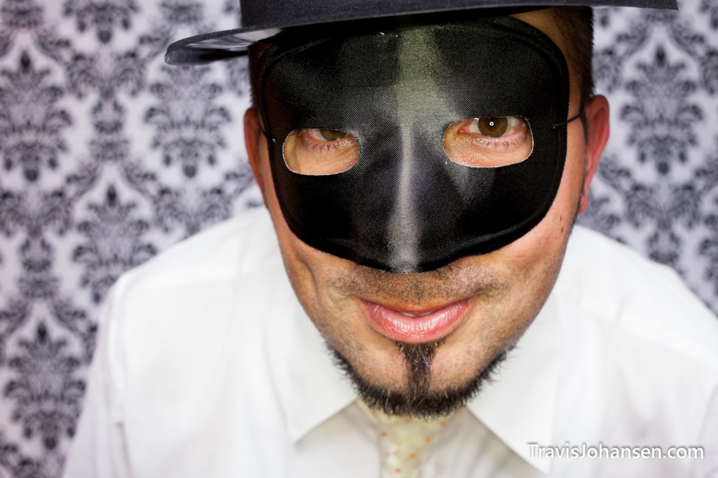 Groom with mask in photo booth - Schaars Bluff MN